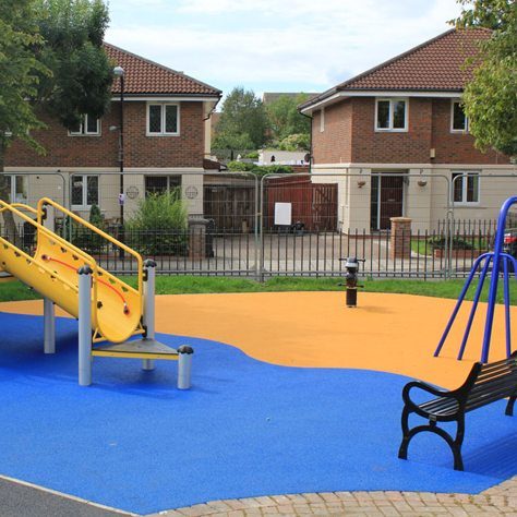 Wetpour rubber mulch playground colourful orange and blue playground