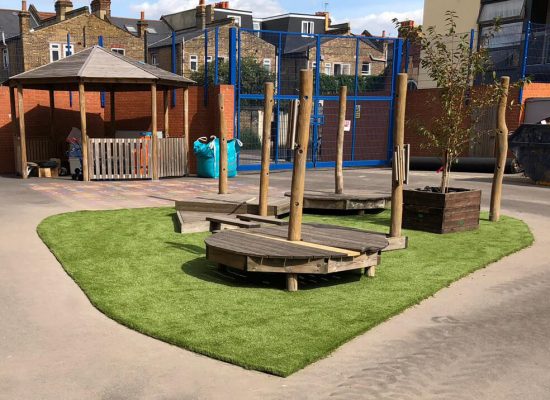 Artificial Grass under wooden equipment