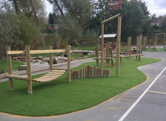 Artificial Grass underneath wooden trim trail