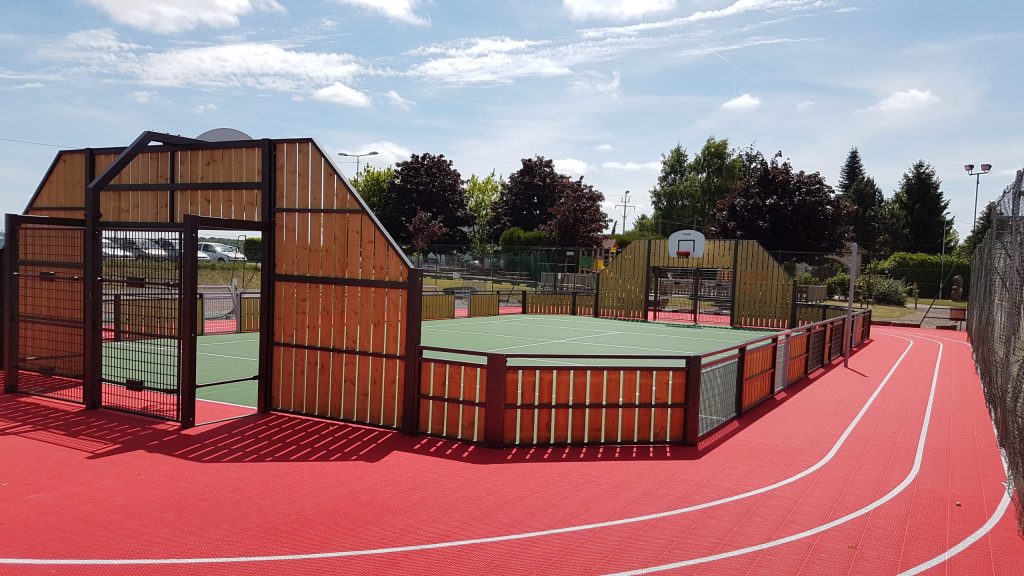 FlexCourt's modular sport surface installed in a MUGA sports court with sports track