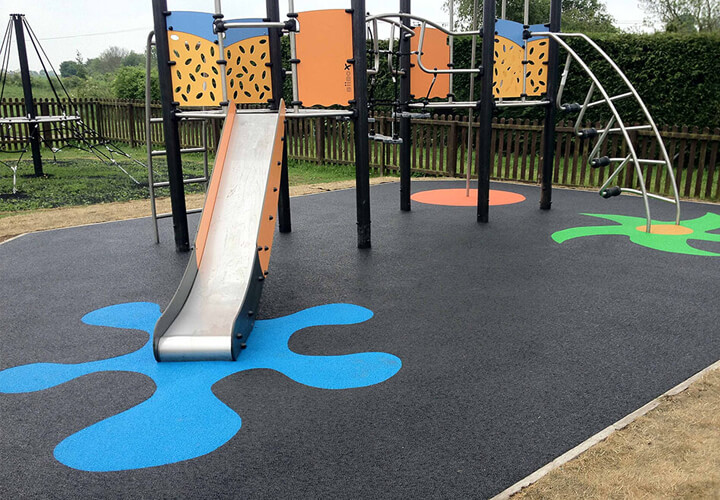 Playground surface with colourful designs