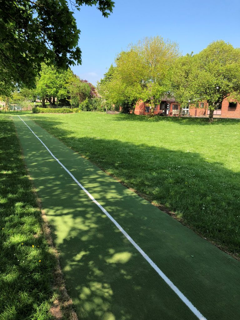 Artificial grass used on a straight running track