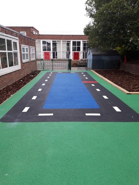 Rubber Surfacing Design with Rectangular Race Track Design for Play