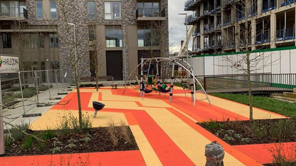 Red and yellow rubber mulch playground safety surfacing