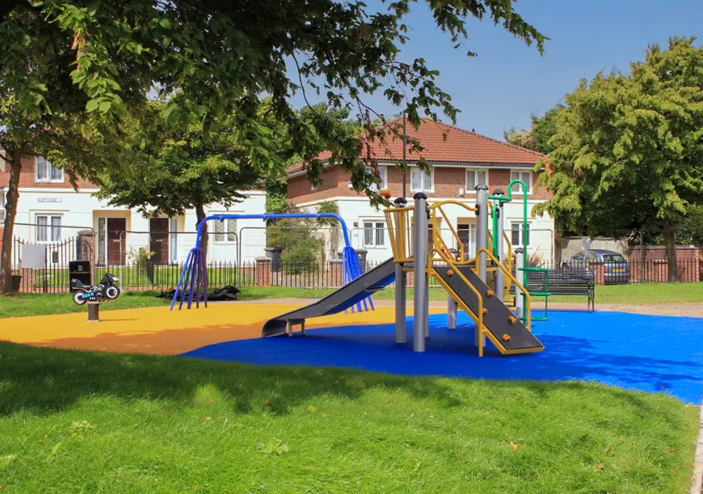 Vivid Poet's Park Vibrant Rubber Playground surfacing in residential area