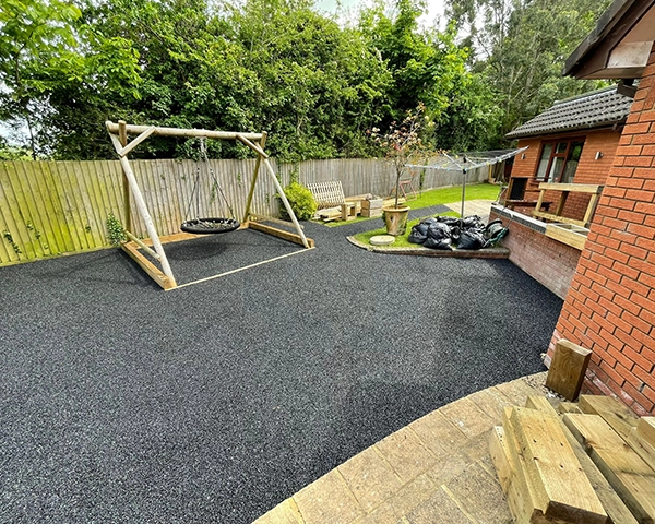 EPDM Rubber Mulch Installation, black rubber surfacing layer