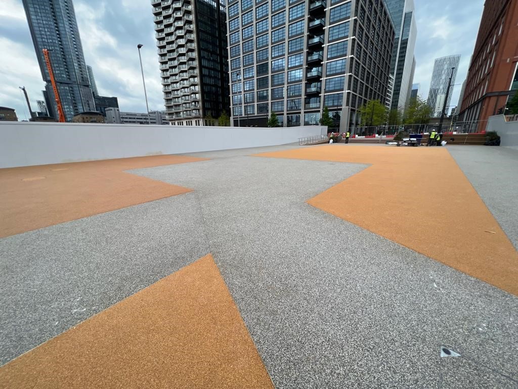 Corkeen surfacing design in urban area installed at Canary Wharf by PlaySmart, your Safety Surfacing Specialists