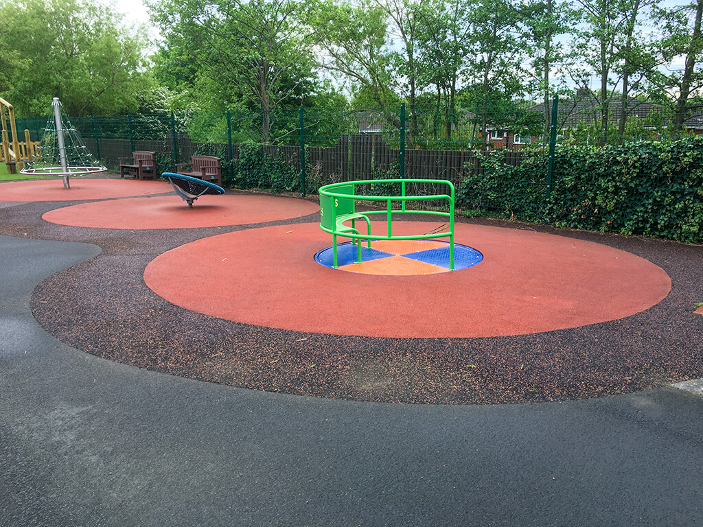 SmartPave aggregate surfacing installed on a playground