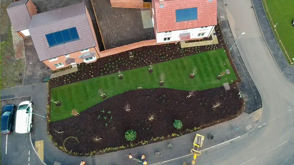 Millbrook Case Study Thumbnail, Overhead drone shot of Bark Mulch & landscaping for Taylor Wimpey