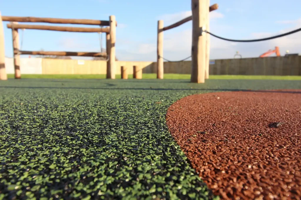 Close-up on EPDM Smart red & green varieties in a playground