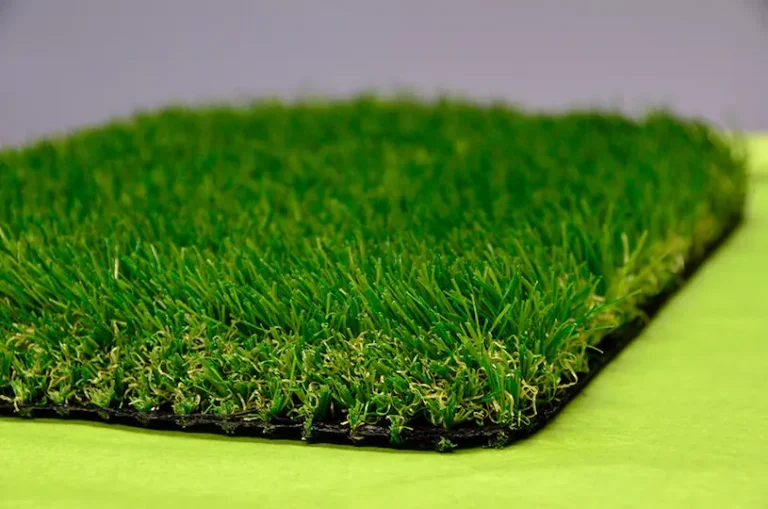 Closeup of a sample of Lush Lawn artificial grass