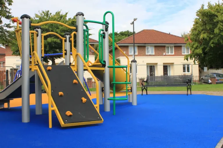 Vivid Poet's Park Vibrant Rubber Playground surfacing in residential area