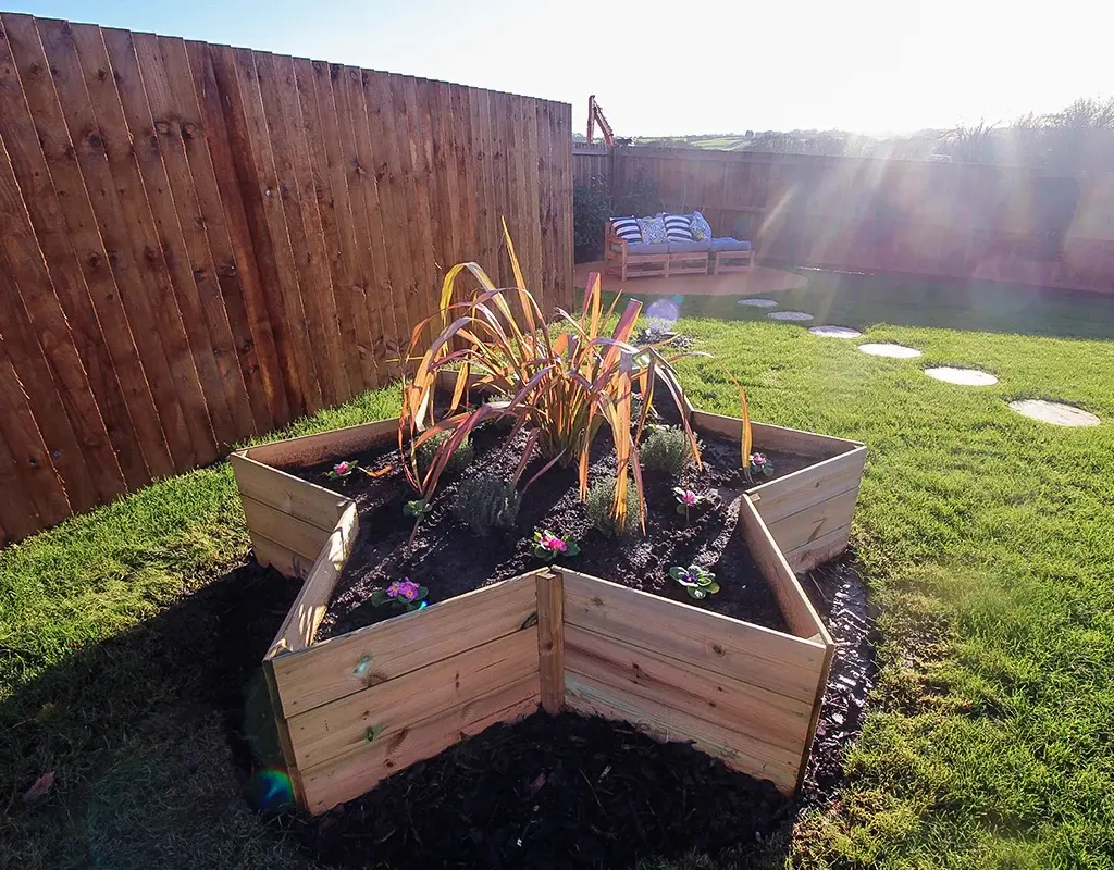 Lawn and raised star-shape planter