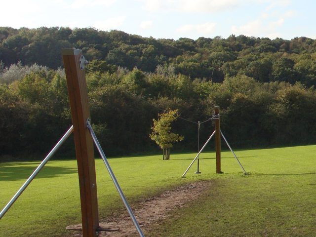 Zip Line pre installation with worn down surfacing surfacing in straight line