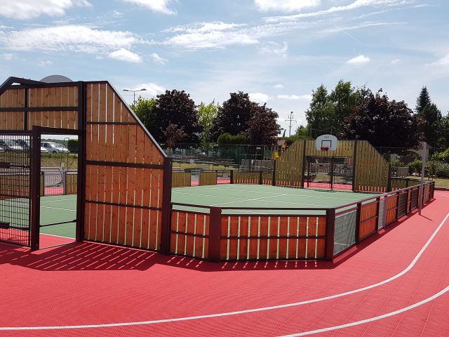 FlexCourt's modular sport surface installed in a MUGA sports court with sports track