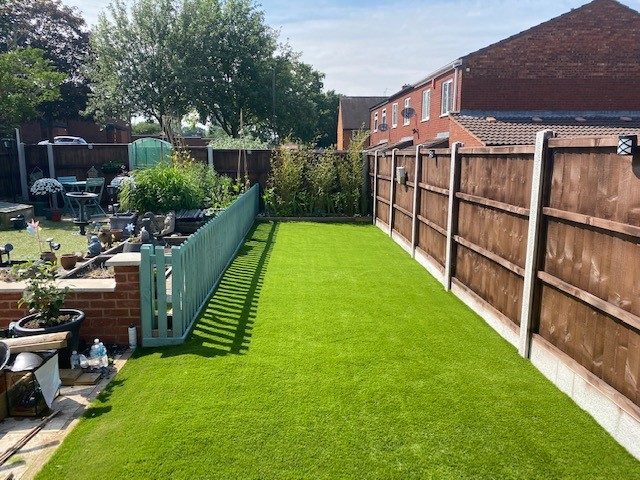 Artificial grass garden safety surface installation