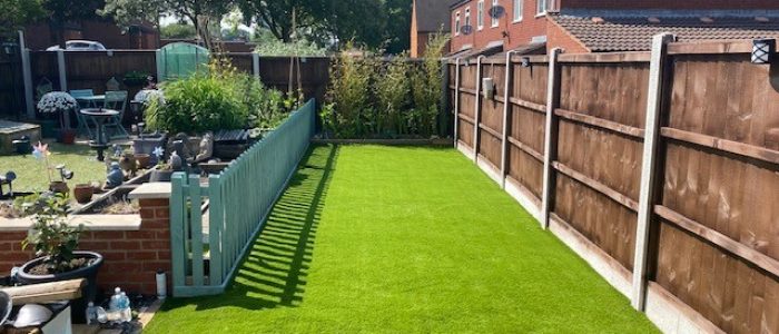 Artificial grass garden safety surface installation