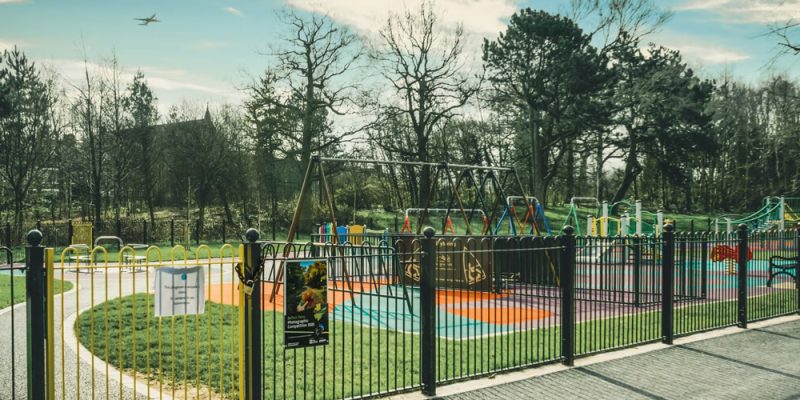 Colourful playground from outside the fence