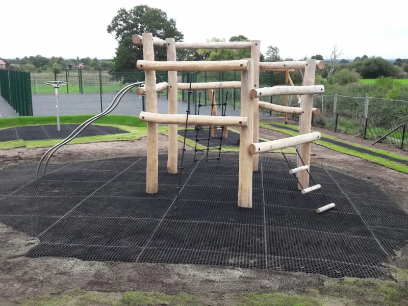 Final step of SmartPlay installation with grass mat installation