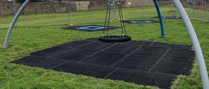 safety surface installation underneath basket swing