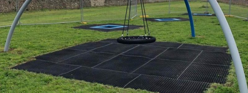 safety surface installation underneath basket swing