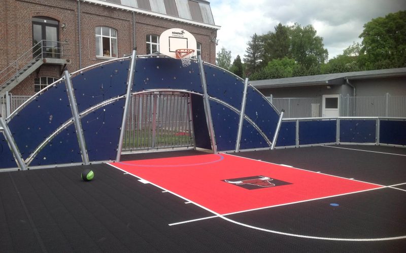 FlexCourt's modular sport surface with custom sports markings installed in a basketball court