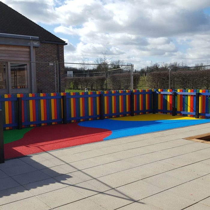 colourful wetpour safety surfacing installation