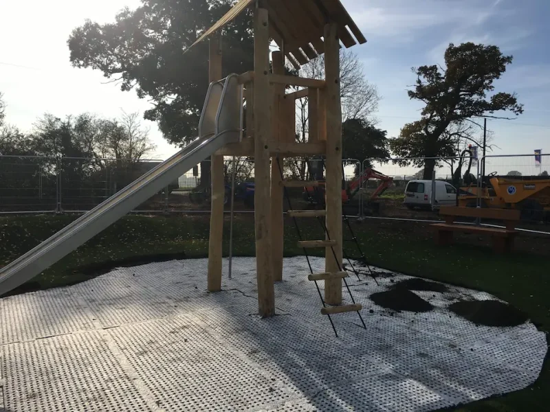 SmartPlay shock pad mid installation below slide tower
