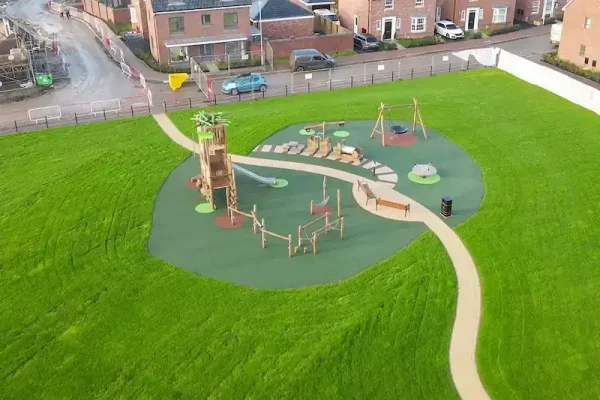 Aerial shot of rubbasmart wetpour playground with train theme