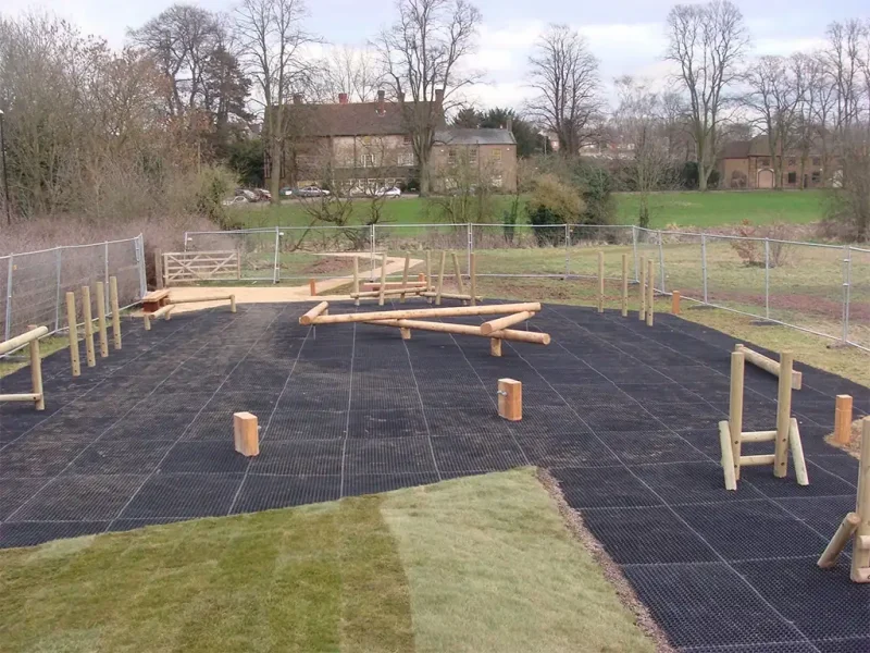 EcoSmart play area with timber trim trail and balancing beams