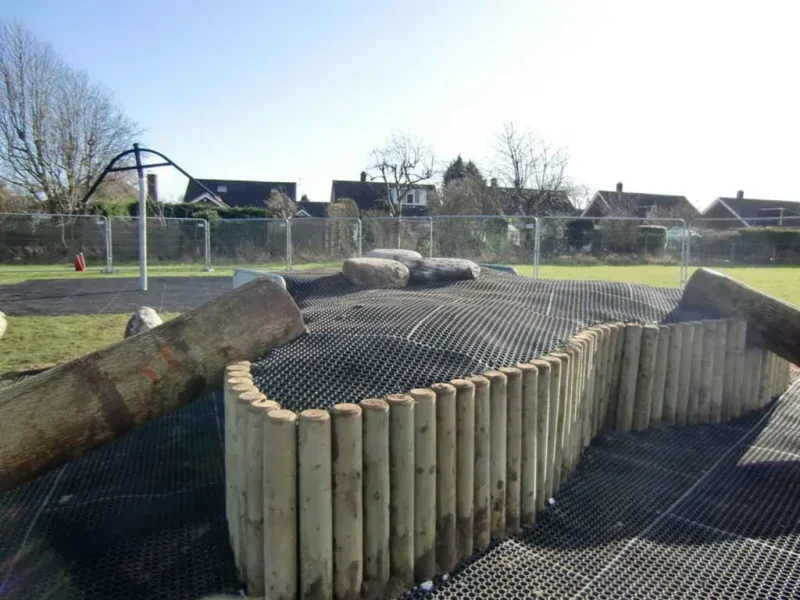 EcoSmart in a built hump in a park with timber supporting exterior