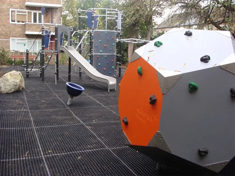 EcoSmart in Moffett Court London play area with modern climbing structure