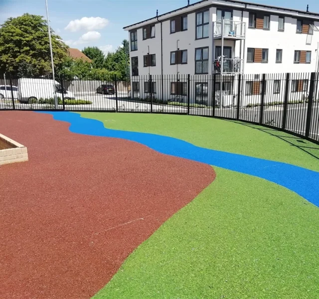 EPDM Mulch River Design with blue, red, and green colours