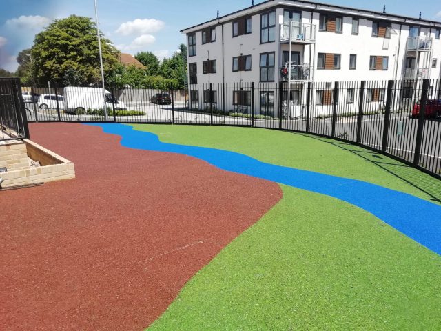 Multi-coloured EPDM Mulch Design on wetpour playground