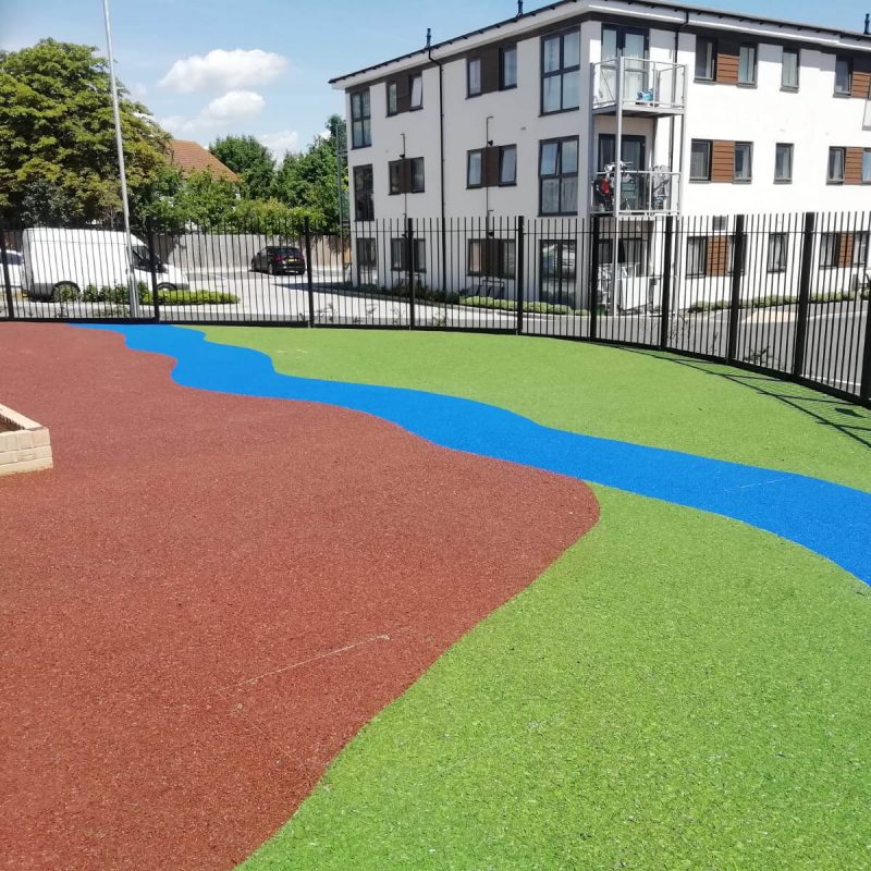 Multi-coloured EPDM Mulch Design on wetpour playground