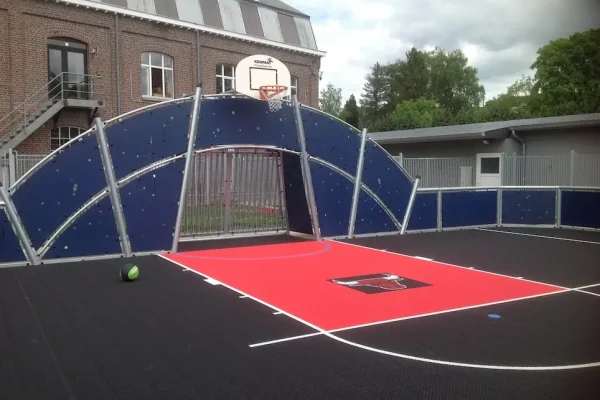 FlexCourt's modular sport surface with custom sports markings installed in a basketball court