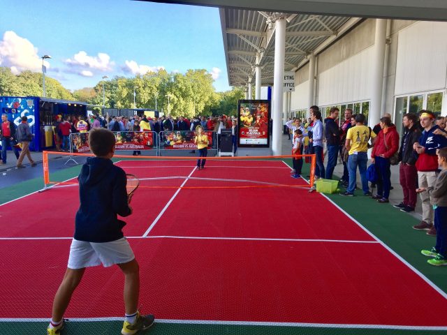 FlexCourt's modular sport surface installed in a tennis court
