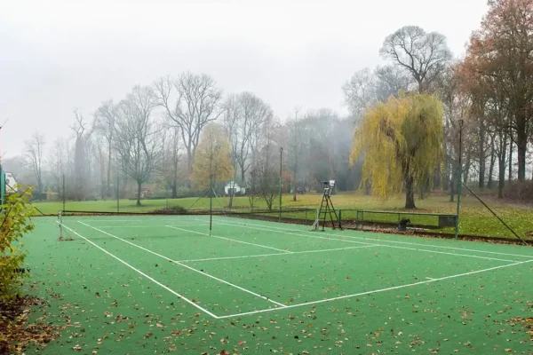 FlexCourt tennis court in a large park