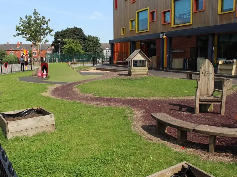Wideshot of Tinsley Meadows Primary School with HybridGrass around a JungleMulch pathway