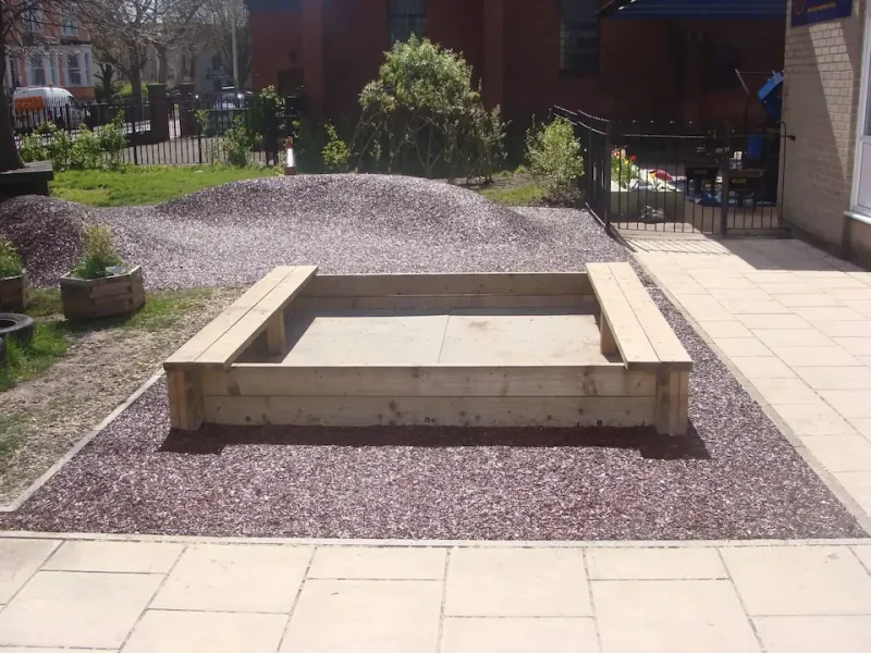 Original JungleMulch terrain hump with wooden bences in a public space