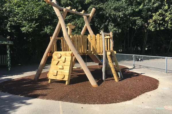Red Rubber Mulch Playground using JungleMulch underneath playground equipment