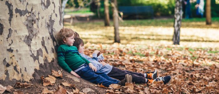 Children sitting outdoors