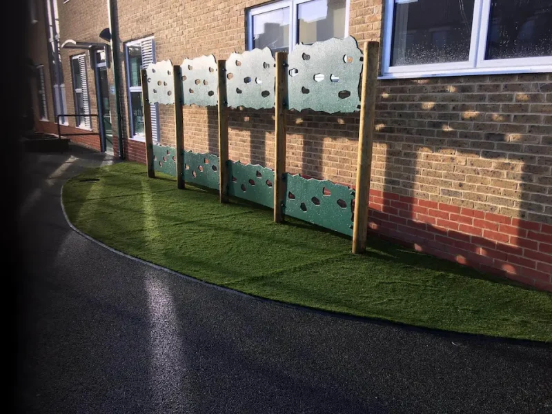 LushLawn playground section with climbing wall sections