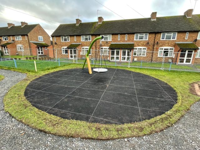 EcoSmart grass mats under nest swing