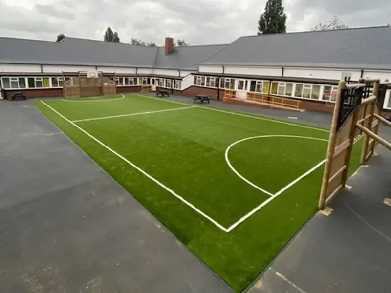 Perfect Pitch green grass carpet with white markings for a school playground football pitch