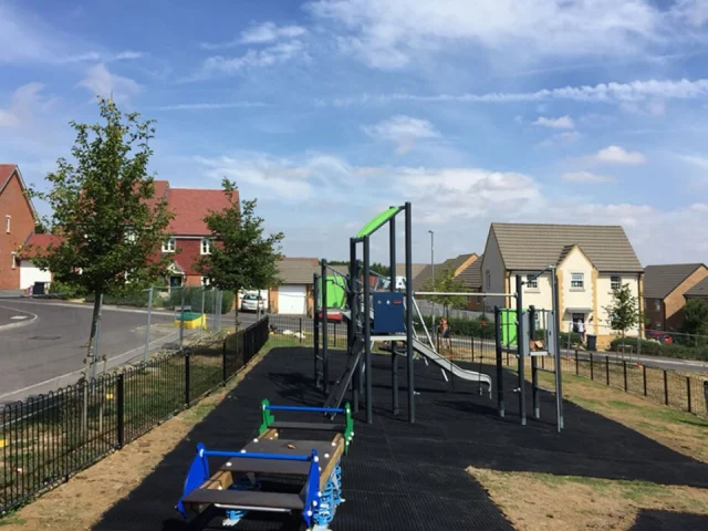 Playground Rubber Mats in Playground underneath tall playground equipment