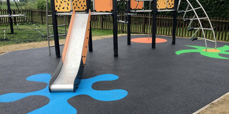 Playground surface with colourful designs