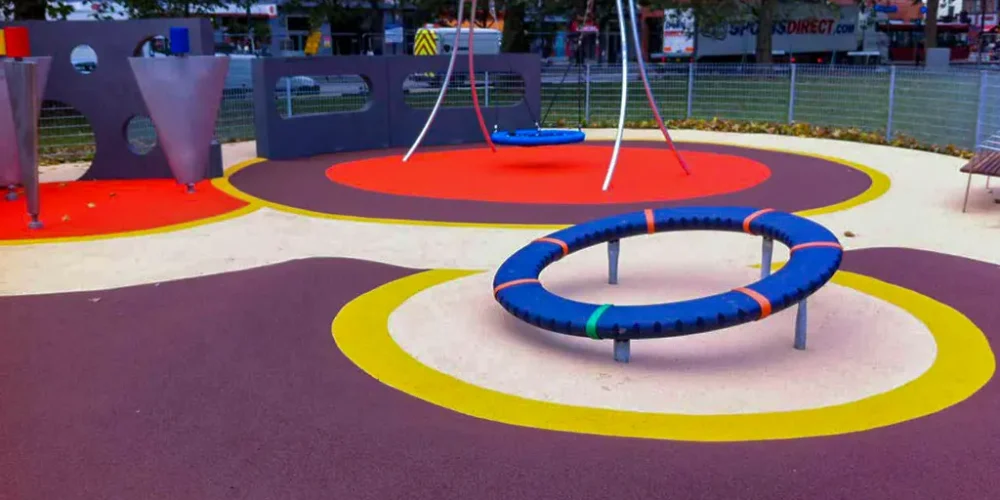 RubbaSmart modern design playground with multi-colour circle and spiral designs