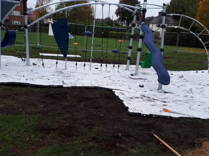 SmartPlay white shockpad installed under climbing frame